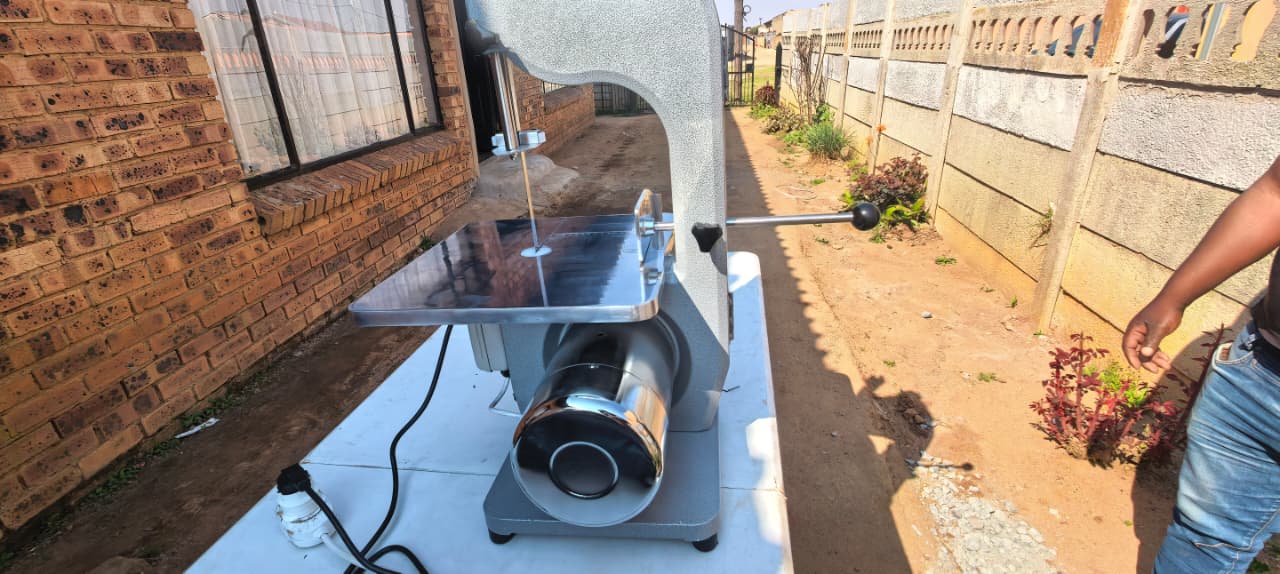 Heavy-duty meat cutter for catering and food preparation hire